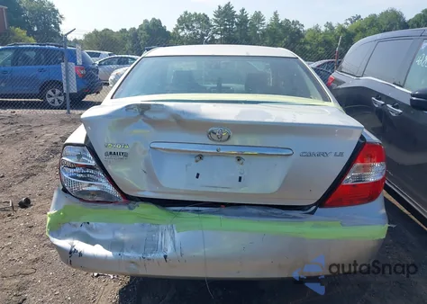 2002 Toyota Camry Le from USA, damaged, VIN 4T1BE32K42U504553